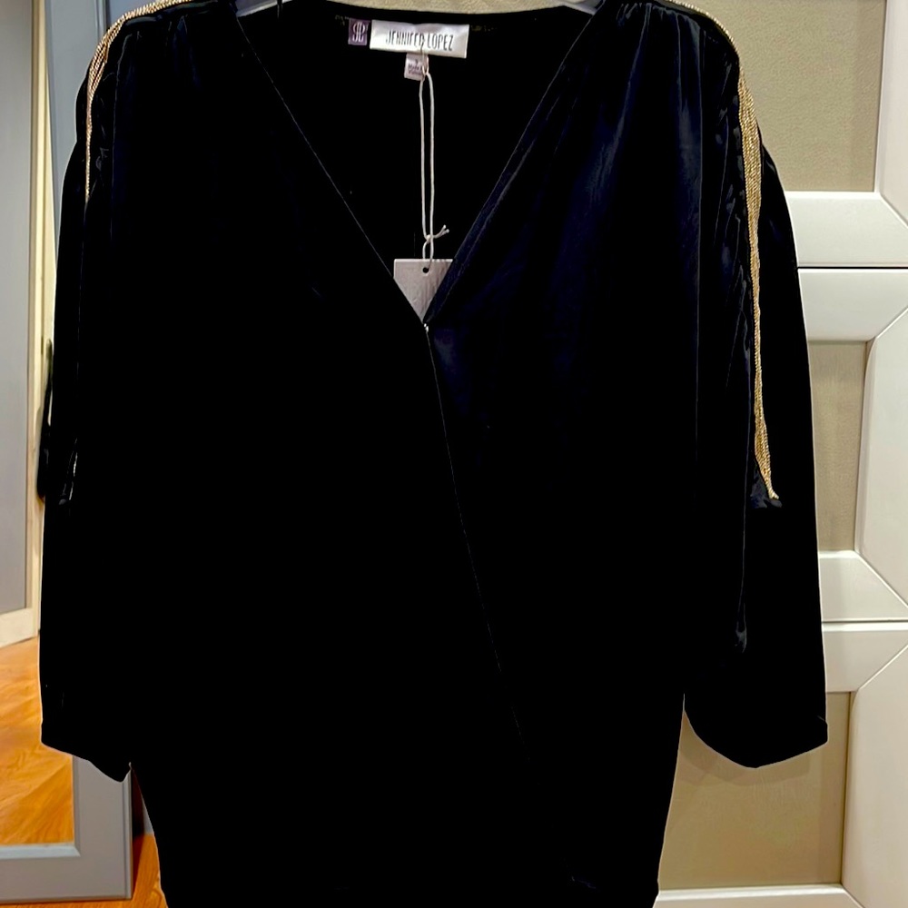 Jennifer Lopez black blouse with gold stripes on sleeves. Size S